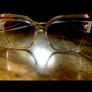 Fashion Sunglasses- Large Cat-eye frame in clear color, they have UV protection